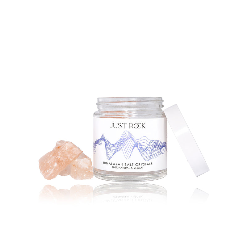 A part of sleep gift set from Elan Skincare, picture showing  a jar of Himalayan salt crystals called Just Rock, the jar is open with a few Himalayan crystals placed by the jar 